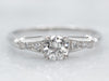 Retro Platinum Diamond Engagement Ring with Diamond Accents