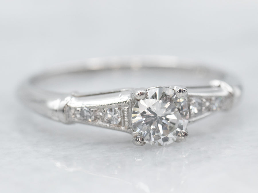 Retro Platinum Diamond Engagement Ring with Diamond Accents