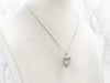 Sophisticated Yellow Gold Blue Topaz Solitaire Pendant