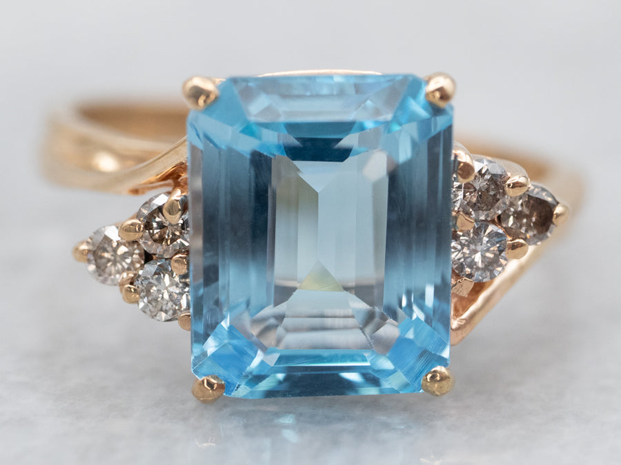 Yellow Gold Emerald Cut Blue Topaz Ring with Diamond Accents