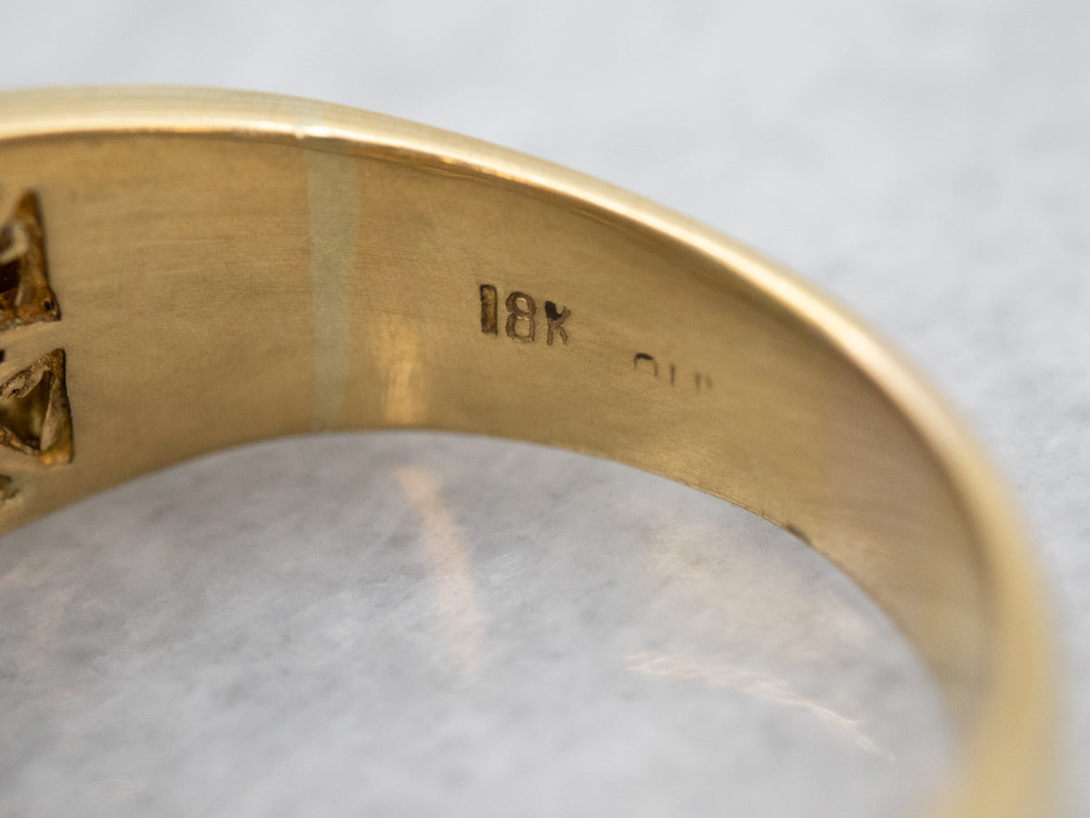 Luxurious Yellow Gold Emerald and Diamond Band