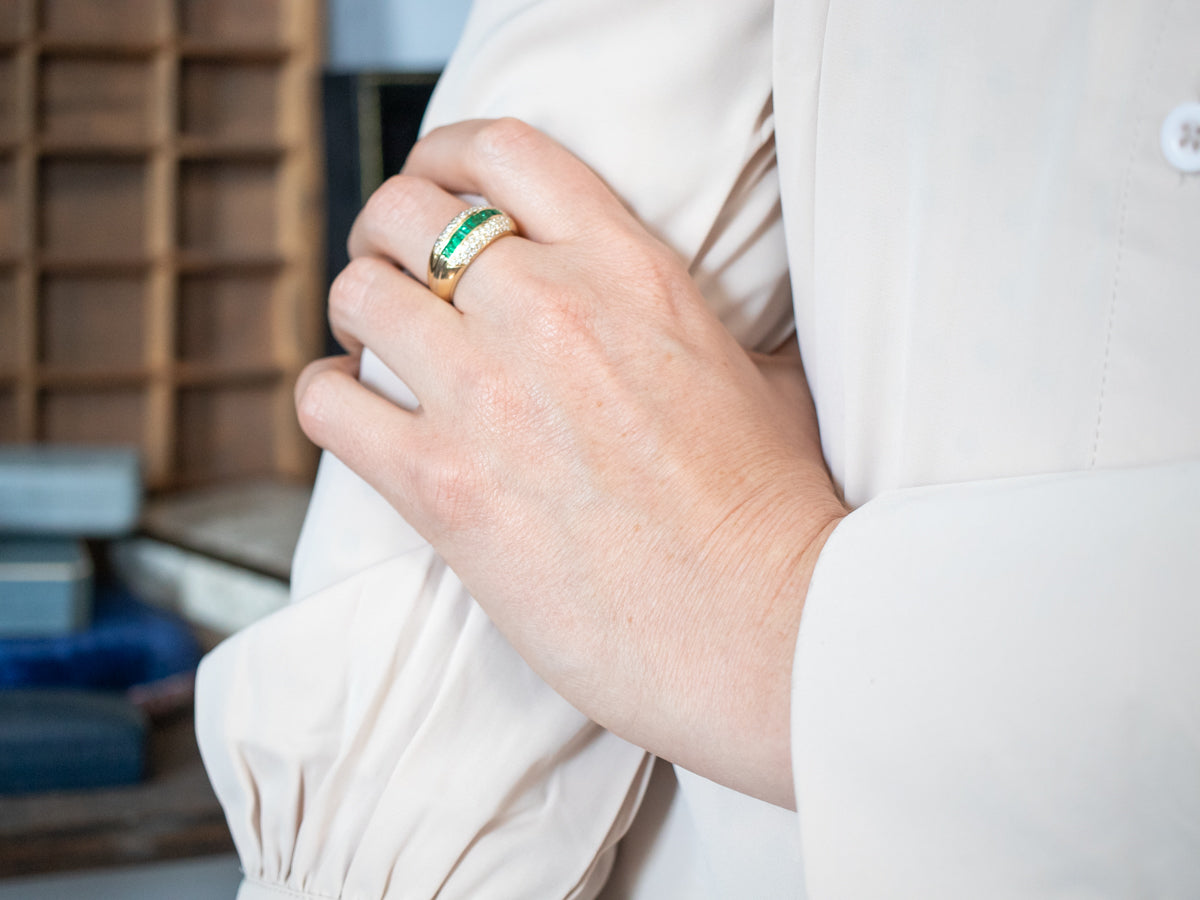 Luxurious Yellow Gold Emerald and Diamond Band