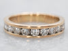 Exquisite Yellow Gold Channel Set Diamond Wedding Band