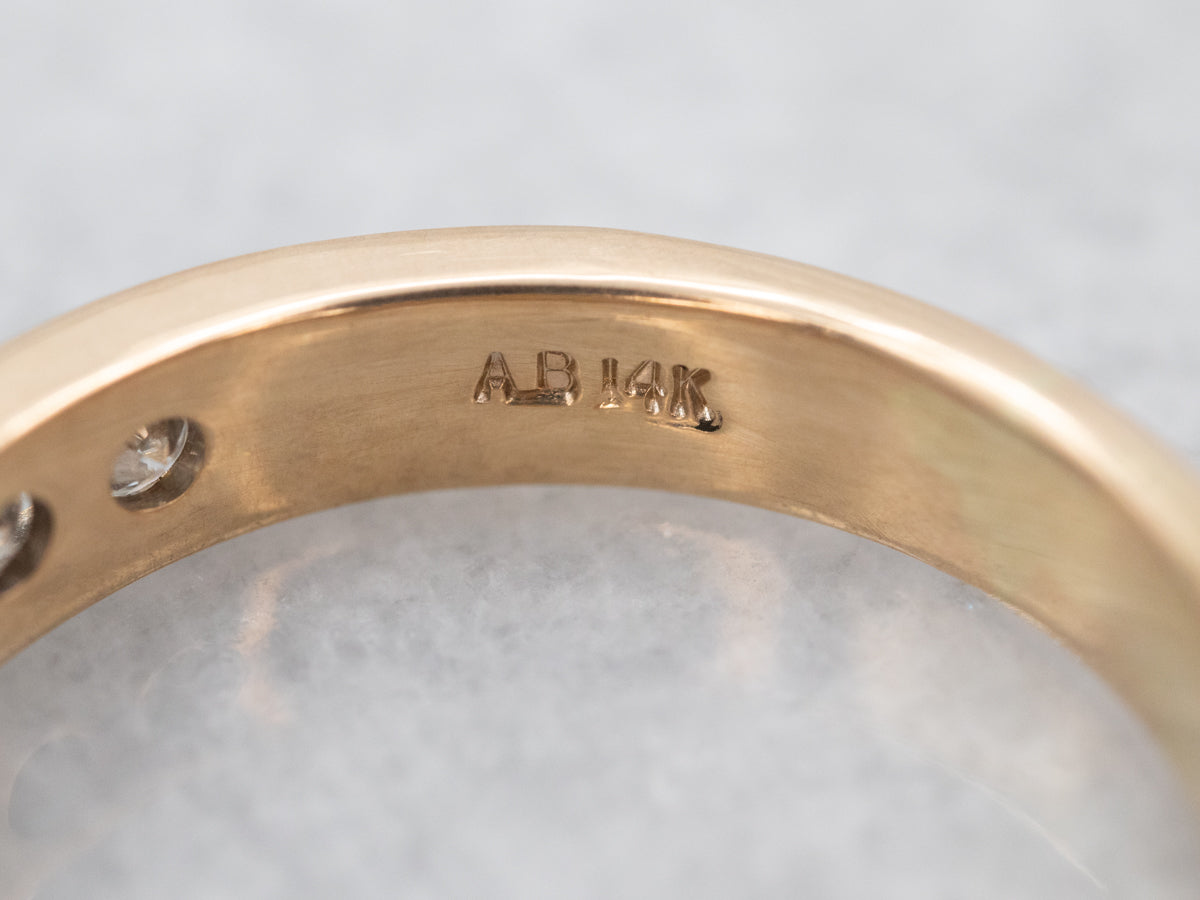 Exquisite Yellow Gold Channel Set Diamond Wedding Band