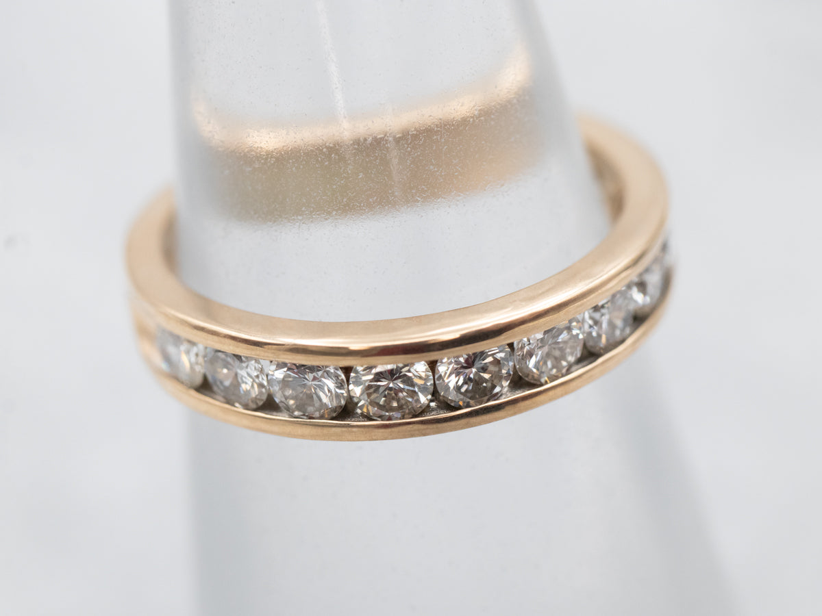 Exquisite Yellow Gold Channel Set Diamond Wedding Band