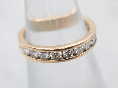 Exquisite Yellow Gold Channel Set Diamond Wedding Band