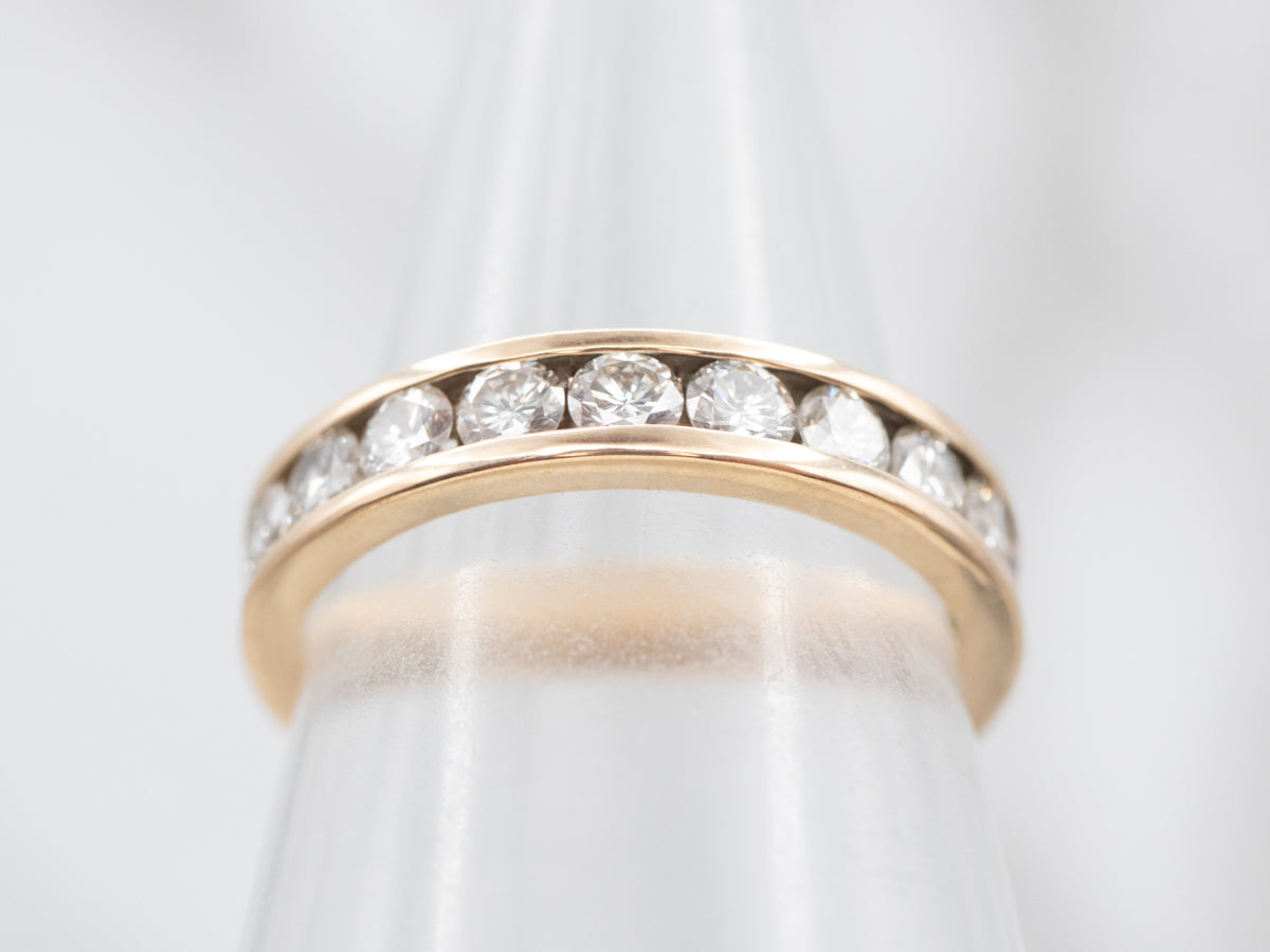 Exquisite Yellow Gold Channel Set Diamond Wedding Band