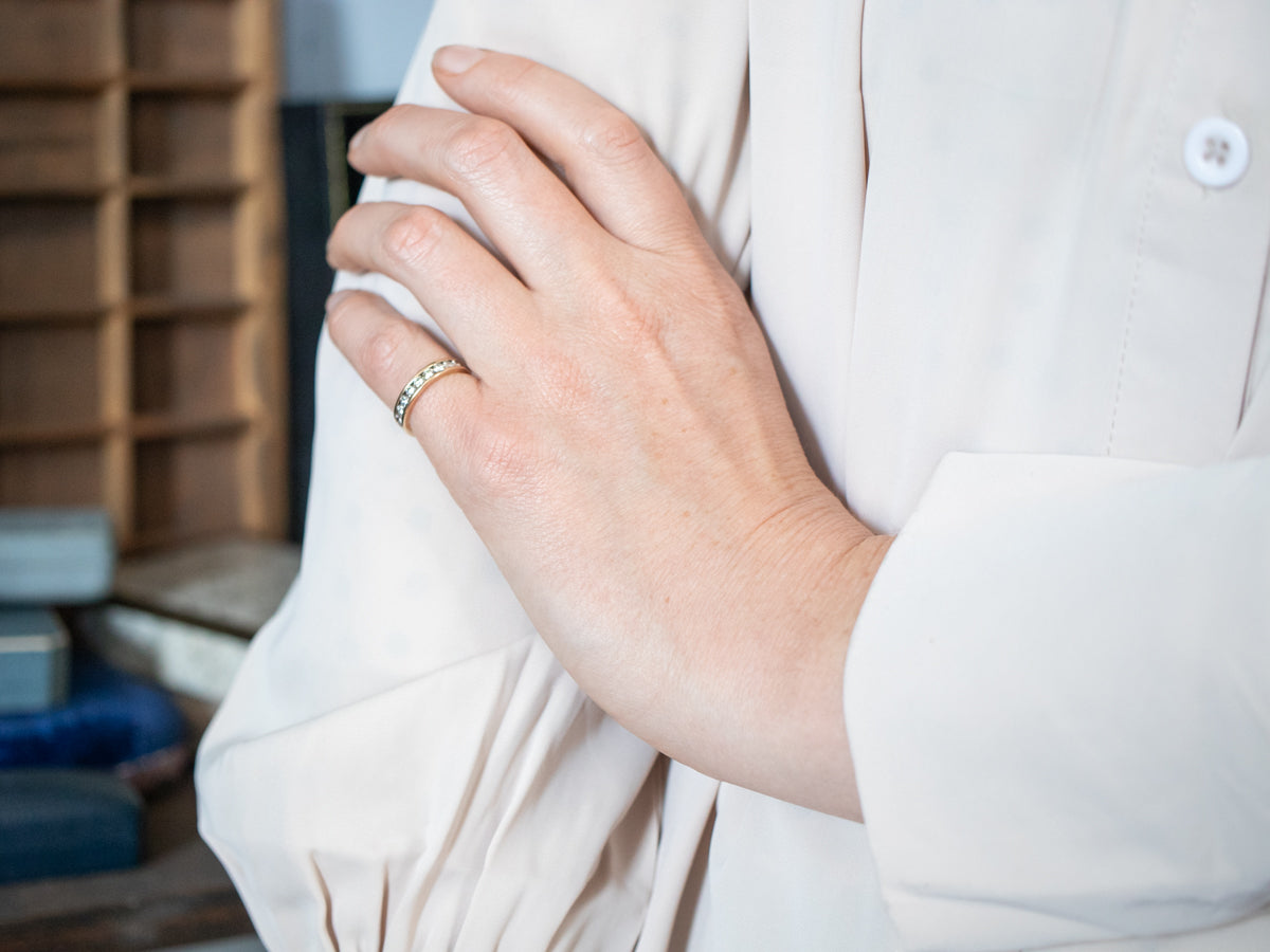 Exquisite Yellow Gold Channel Set Diamond Wedding Band