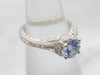 Gorgeous White Gold Sapphire Engagement Ring with Diamond Accents and Decorated Shoulders
