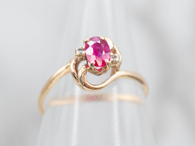 Enchanting Yellow Gold Ruby Bypass Ring with Diamond Accents