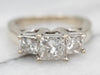Past, Present, and Future White Gold Three Stone Princess Cut Diamond Engagement Ring