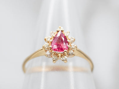 Luxurious Yellow Gold Pear Cut Pink Sapphire Ring with Diamond Halo