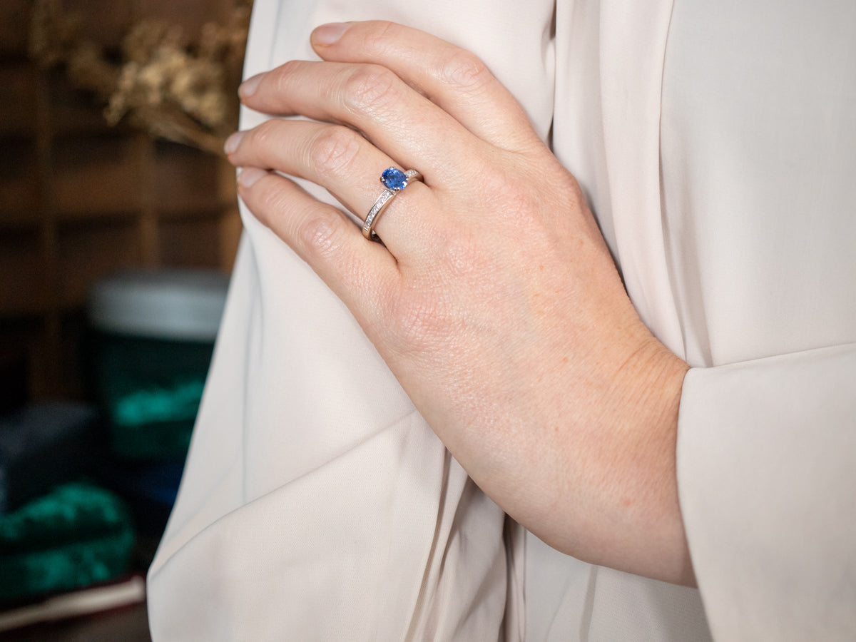 Elegant White Gold Sapphire Engagement Ring with Diamond Shoulders