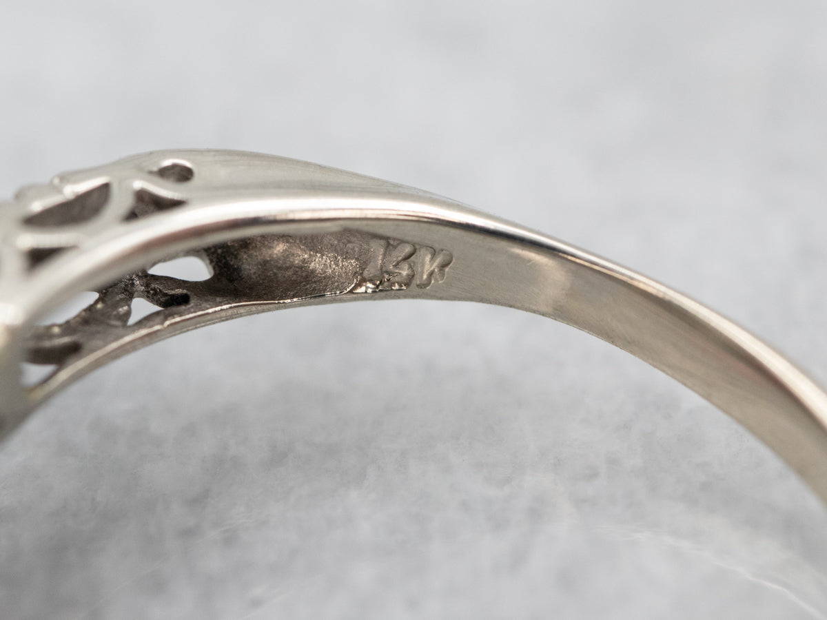 Delicate White Gold Pyrope Garnet Ring with Diamond Accents