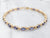 Unique Yellow Gold Iolite Tennis Bracelet with Flower Details