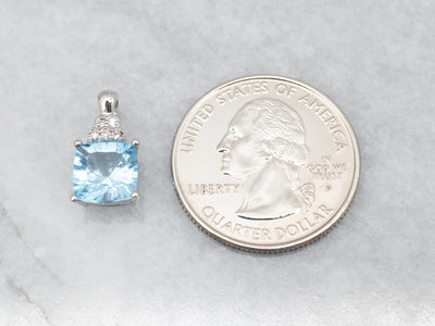 White Gold Blue Topaz and Diamond Pendant
