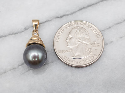 Yellow Gold Black Pearl Pendant with Diamond Accent