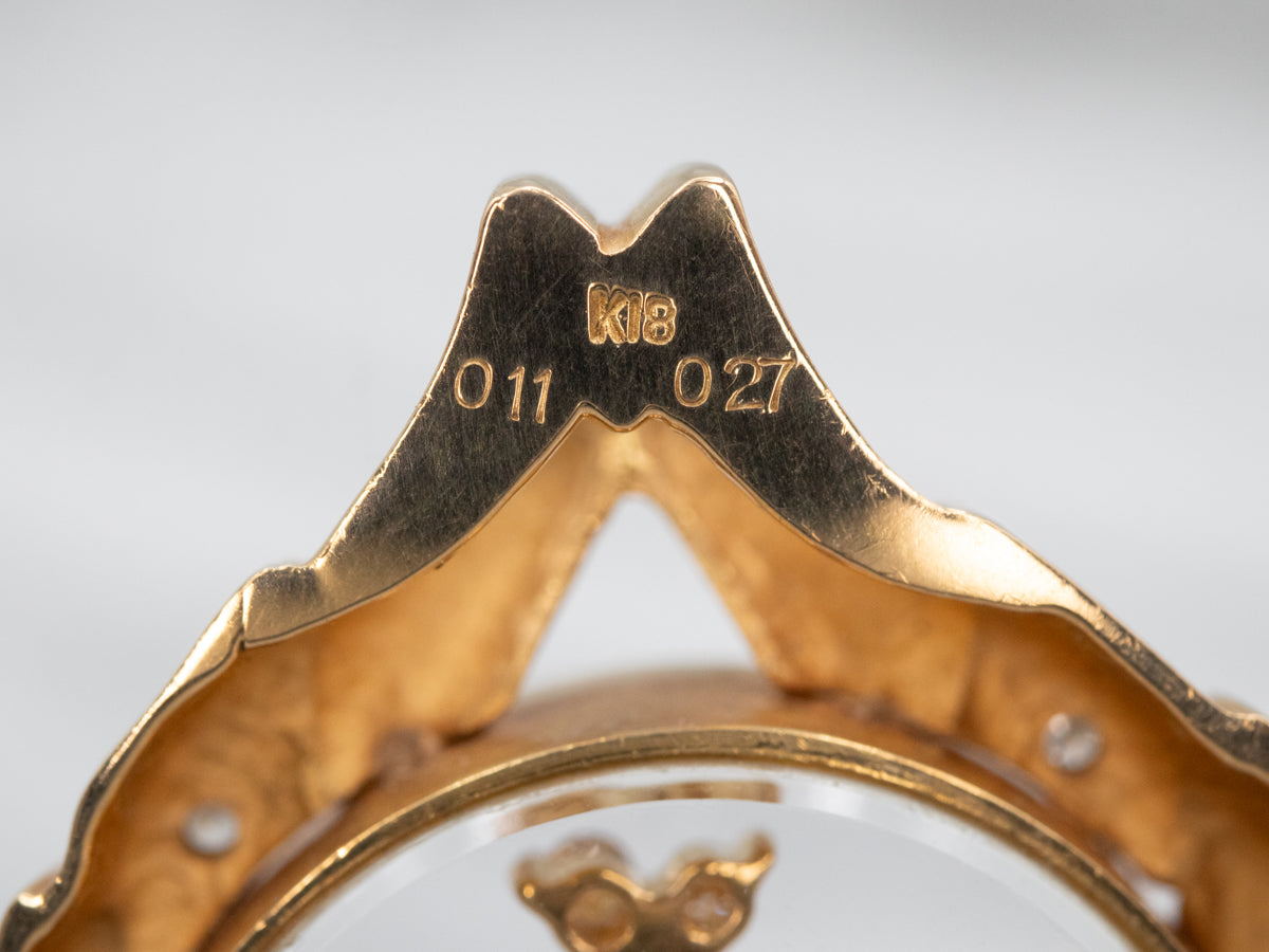 Yellow Gold Diamond and Ruby Spinner Pendant