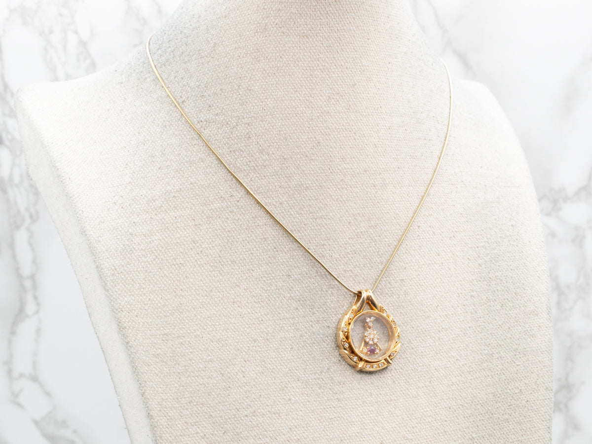 Yellow Gold Diamond and Ruby Spinner Pendant