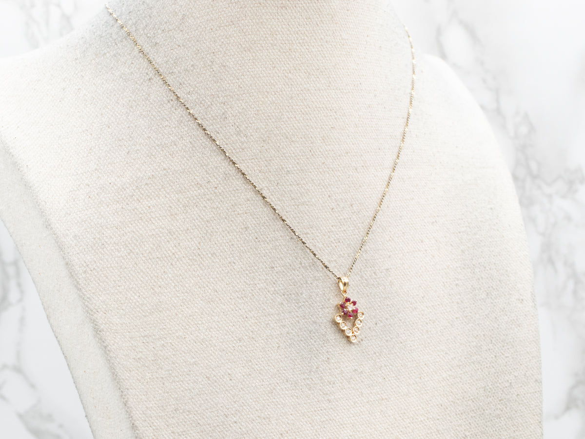 Yellow Gold Ruby and Diamond Flower Pendant