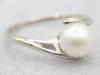 Modernist White Gold Pearl Bypass Ring