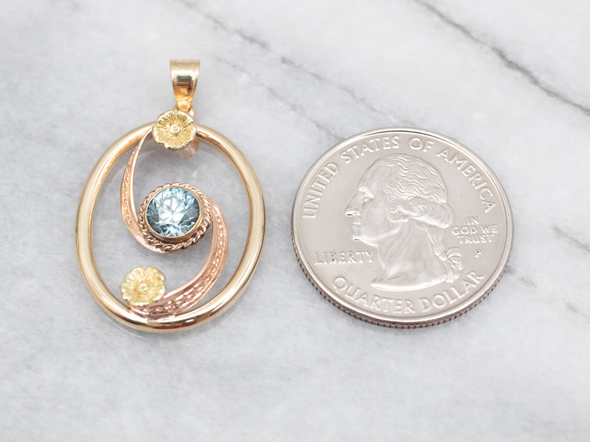 Two Tone Blue Zircon Swirl Pendant with Flower Accents