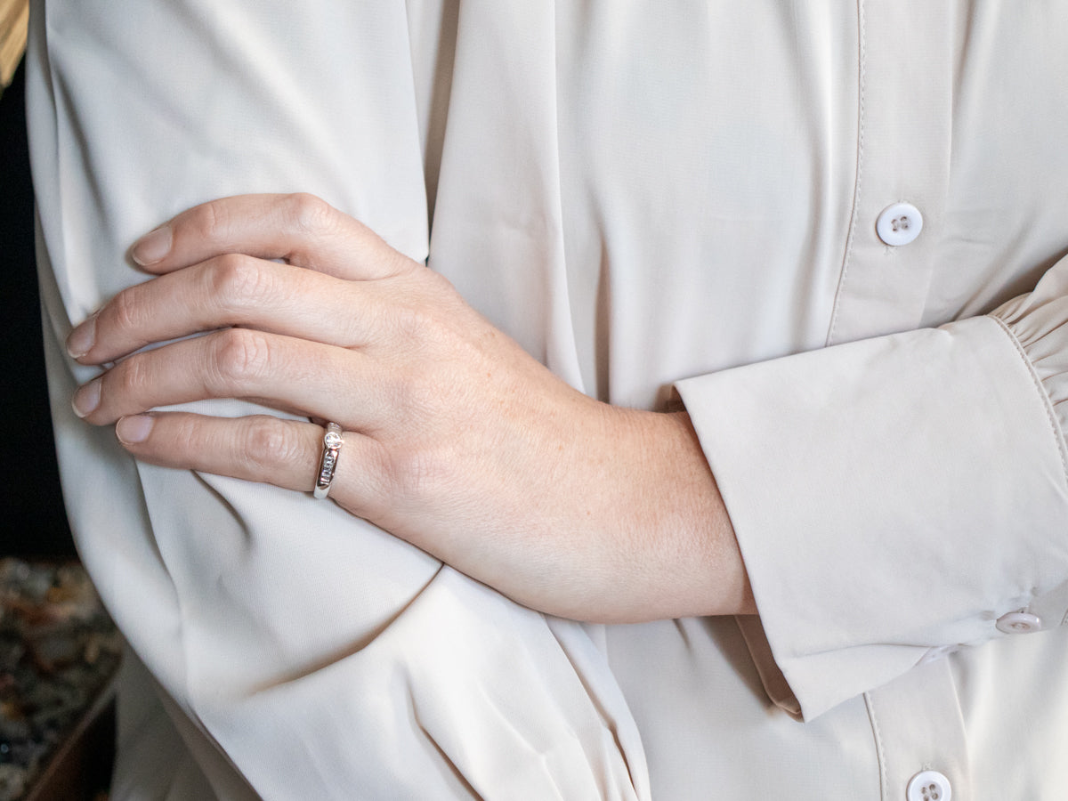 Modern Bezel Set Diamond Engagement Ring with Diamond Accents