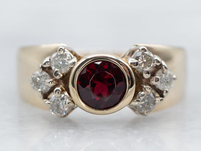 Sleek Bezel Set Garnet Ring with Diamond Accents