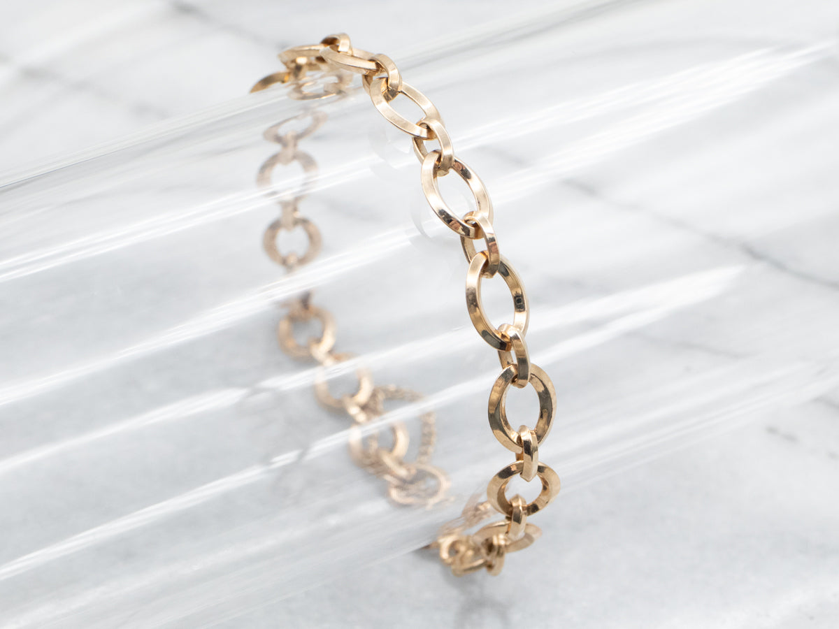 Pulsera de eslabones ovalados de oro vintage con cadena de seguridad