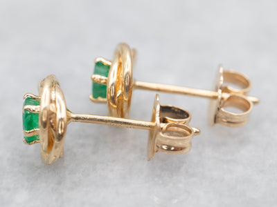 Twisting Gold Emerald Stud Earrings