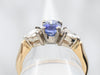 Two Tone Sapphire Engagement Ring with Pear Cut Diamond Accents