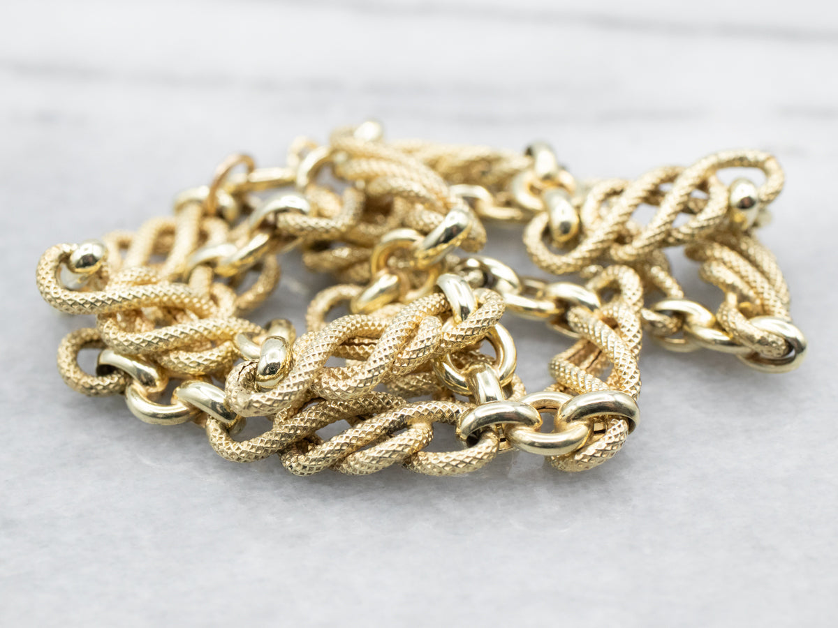 Yellow Gold Textured Knot Link with Spring Ring Clasp