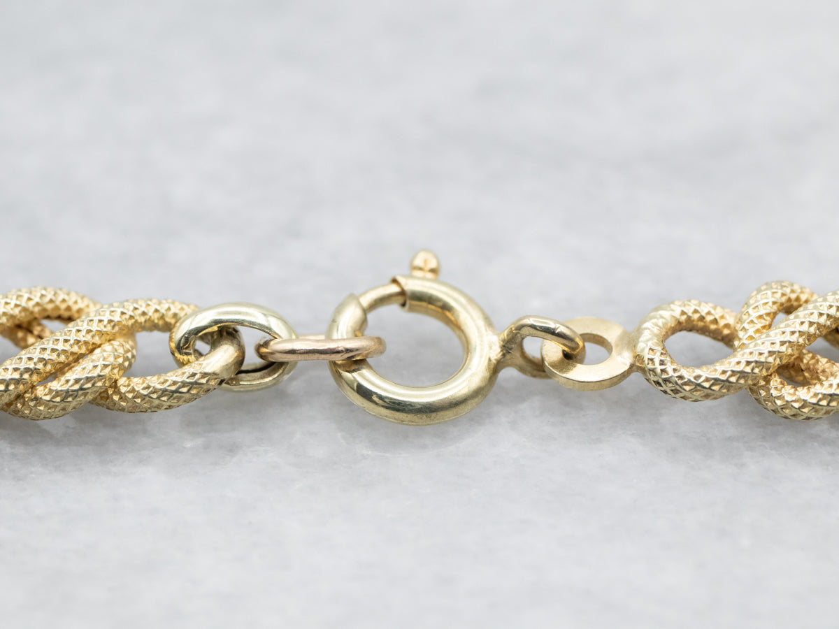 Yellow Gold Textured Knot Link with Spring Ring Clasp