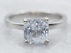 Modern Platinum White Sapphire Solitaire Engagement Ring