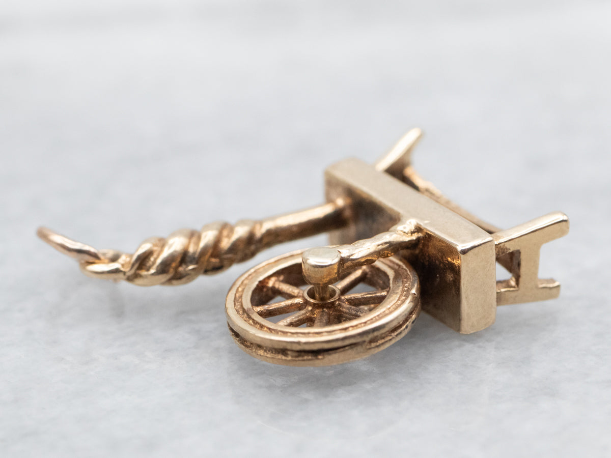 Charm Rueda giratoria dorada de la Bella Durmiente