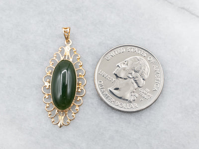 Yellow Gold Jade Pendant with Scrolling Frame