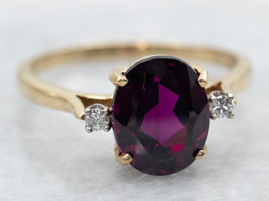 Yellow Gold Oval Cut Rhodolite Garnet Ring with Diamond Accents
