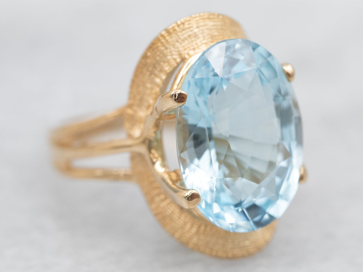 Yellow Gold Blue Topaz Solitaire Ring