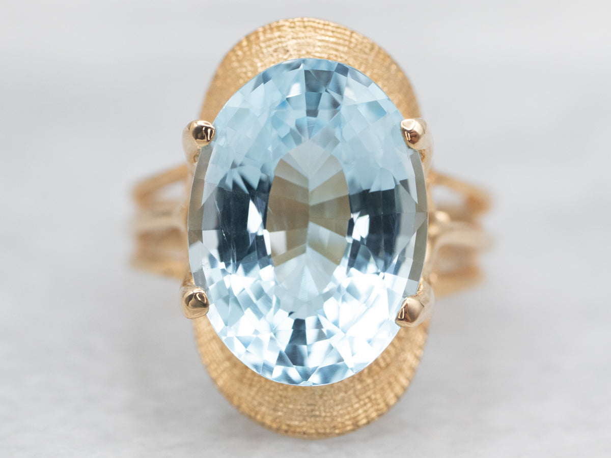 Yellow Gold Blue Topaz Solitaire Ring
