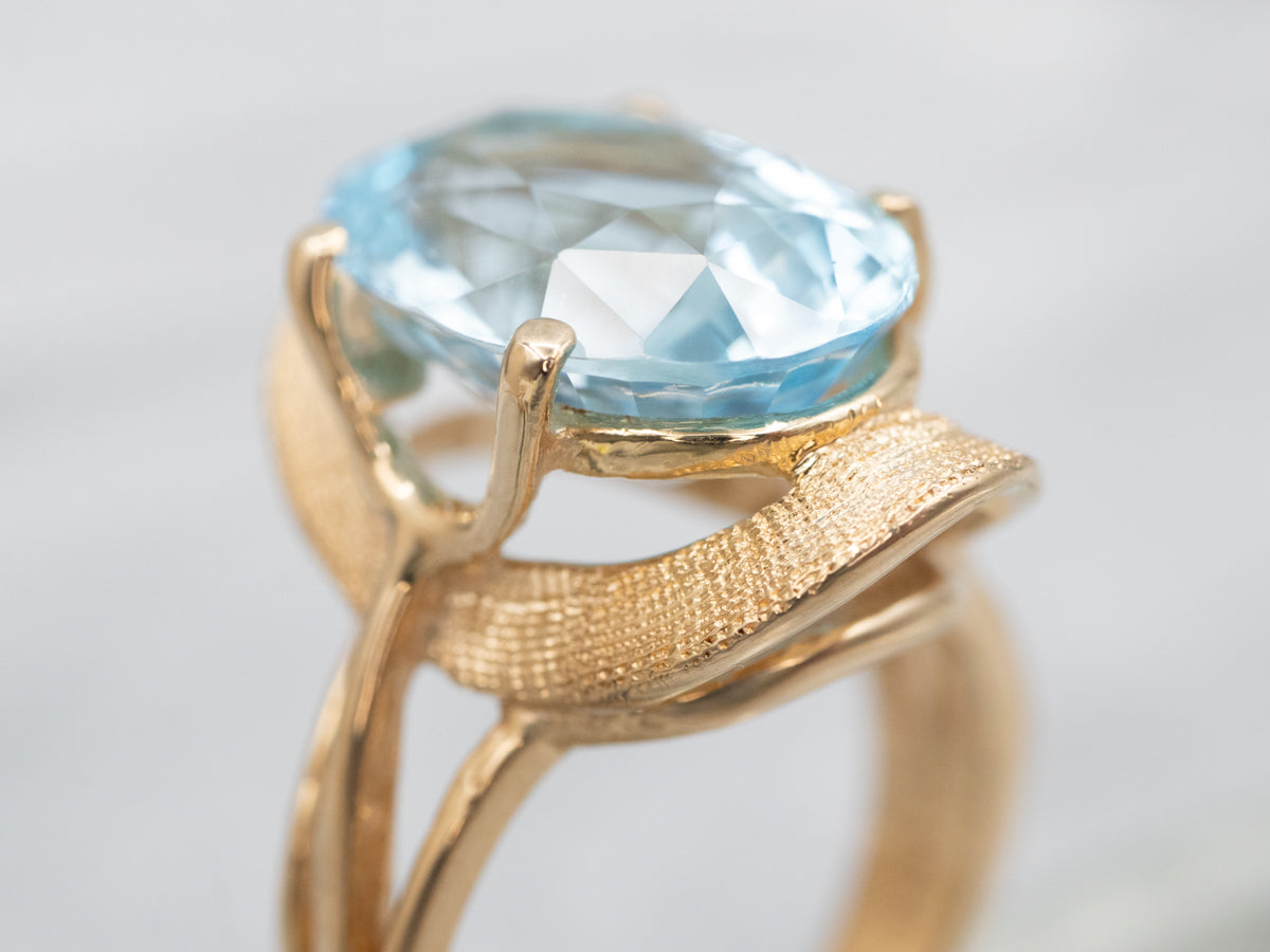 Yellow Gold Blue Topaz Solitaire Ring