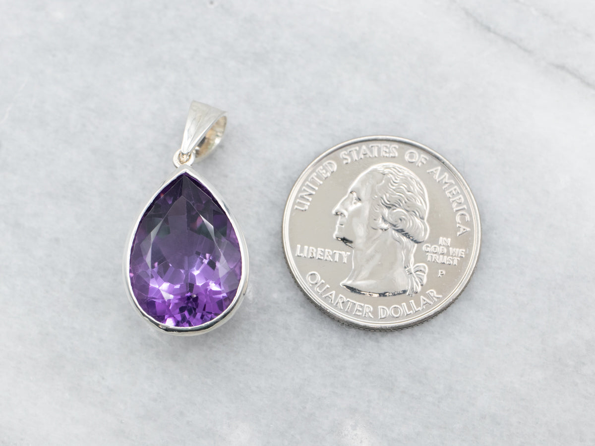 Sterling Silver Pear Cut Bezel Set Amethyst Pendant