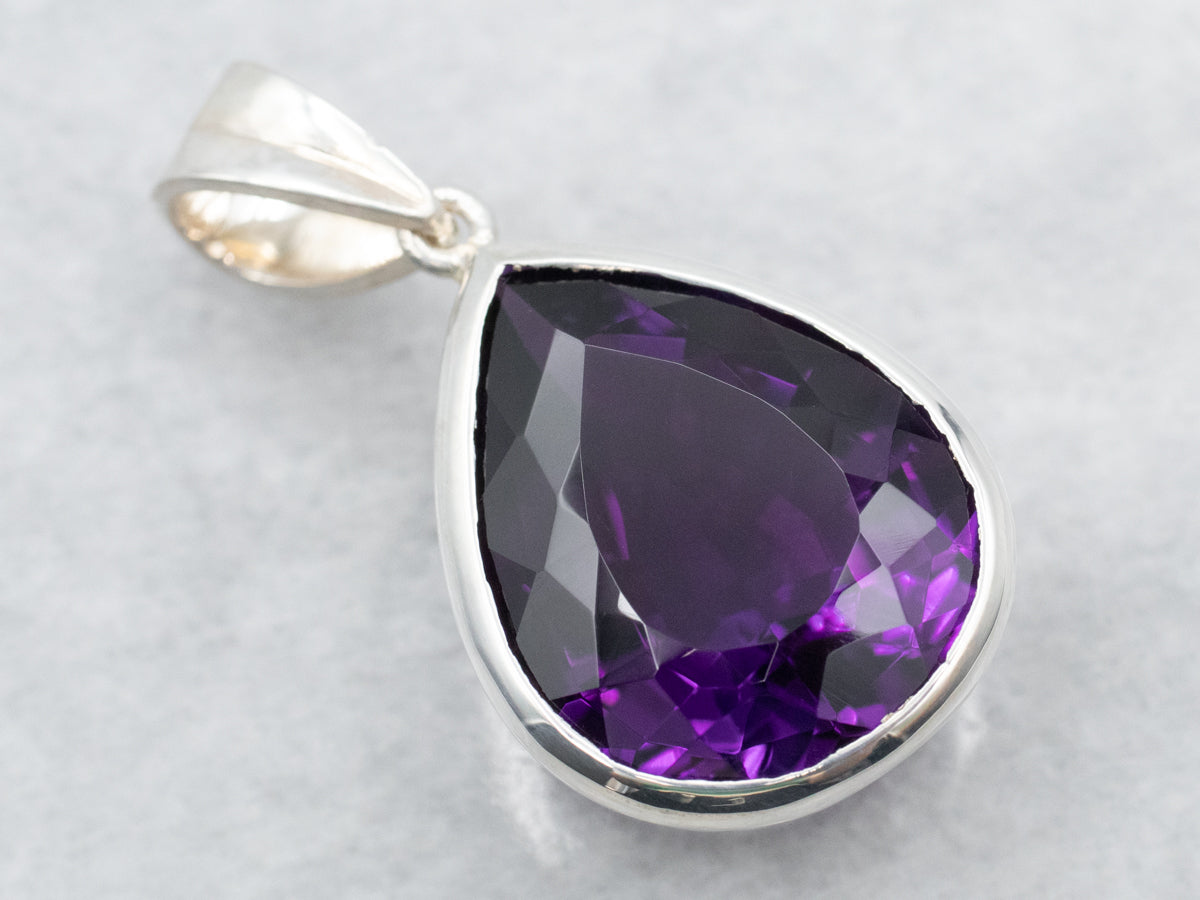 Sterling Silver Pear Cut Bezel Set Amethyst Pendant