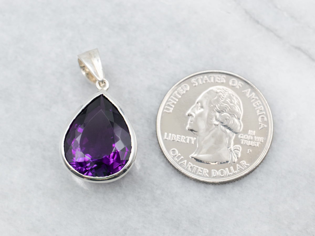 Sterling Silver Pear Cut Bezel Set Amethyst Pendant