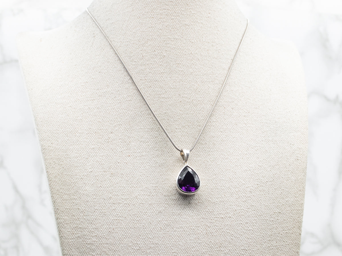 Sterling Silver Pear Cut Bezel Set Amethyst Pendant