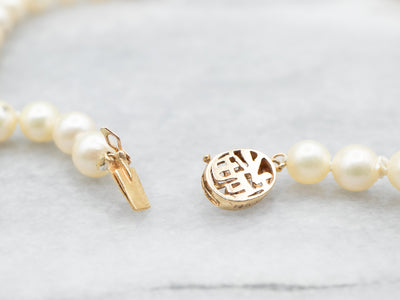 Saltwater Pearl Necklace with Gold Asian Character Clasp