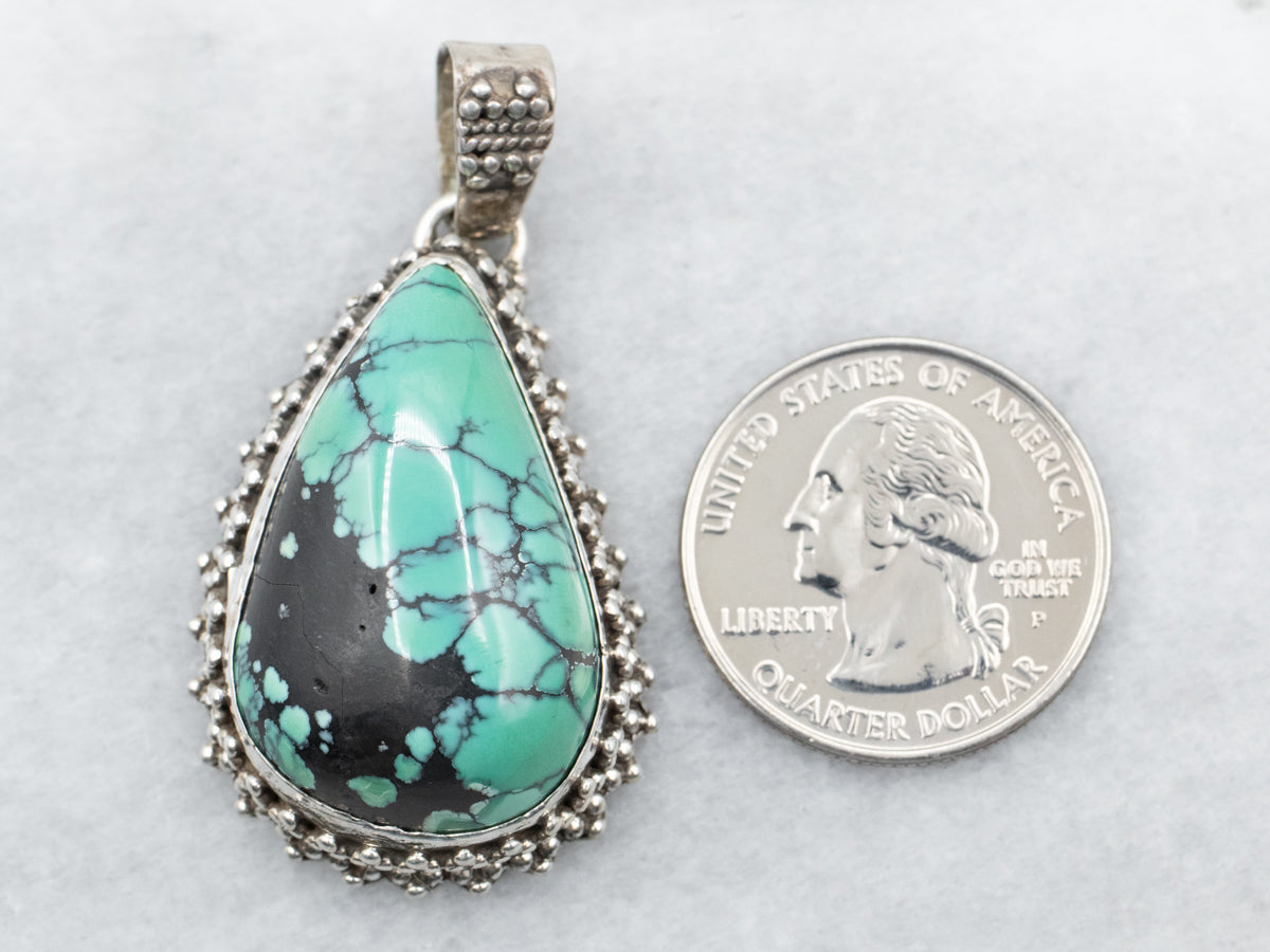Sterling Silver Pear Cut Turquoise Pendant with Beaded Frame