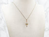 Yellow Gold Diamond Cluster Pendant with Seed Pearl Accent