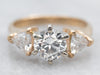 Stunning Round Brilliant and Trillion Cut Diamond Engagement Ring