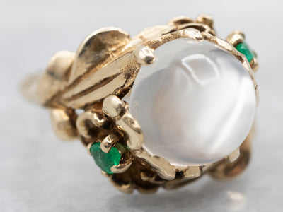 Yellow Gold Moonstone Ring with Emerald Accents
