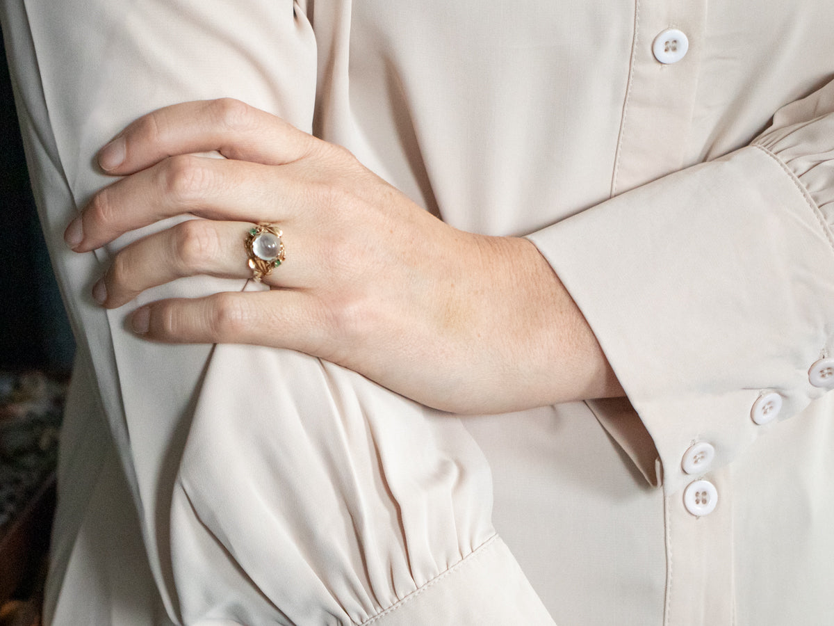 Yellow Gold Moonstone Ring with Emerald Accents